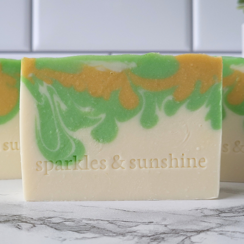 Picture of white soap with green and yellow swirls