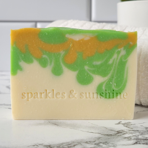 Picture of white soap with green and yellow swirls