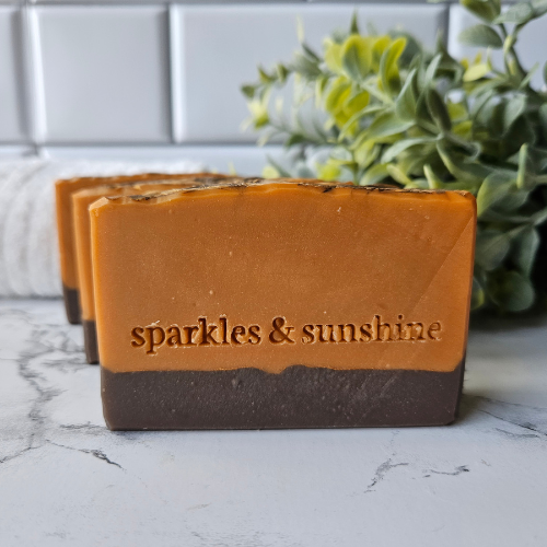 Picture of an orange and brown bar of soap