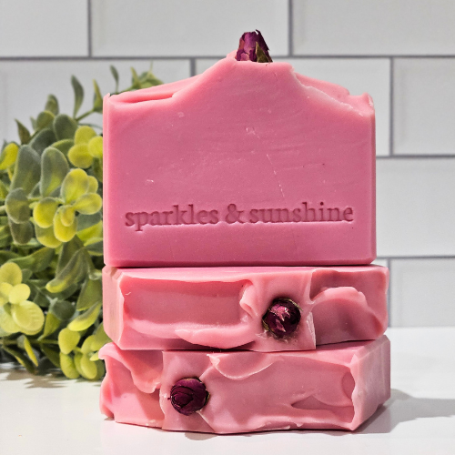 Picture of pink soap with a rose bud on top