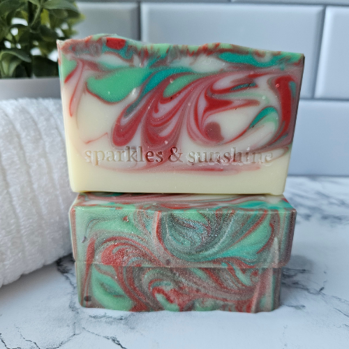 Picture of white soap with red and green swirls.